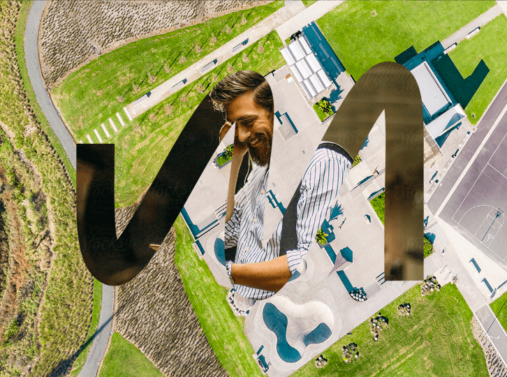 Aerial view of a field with a Meridiam M cut out revealing a man in a shirt smiling