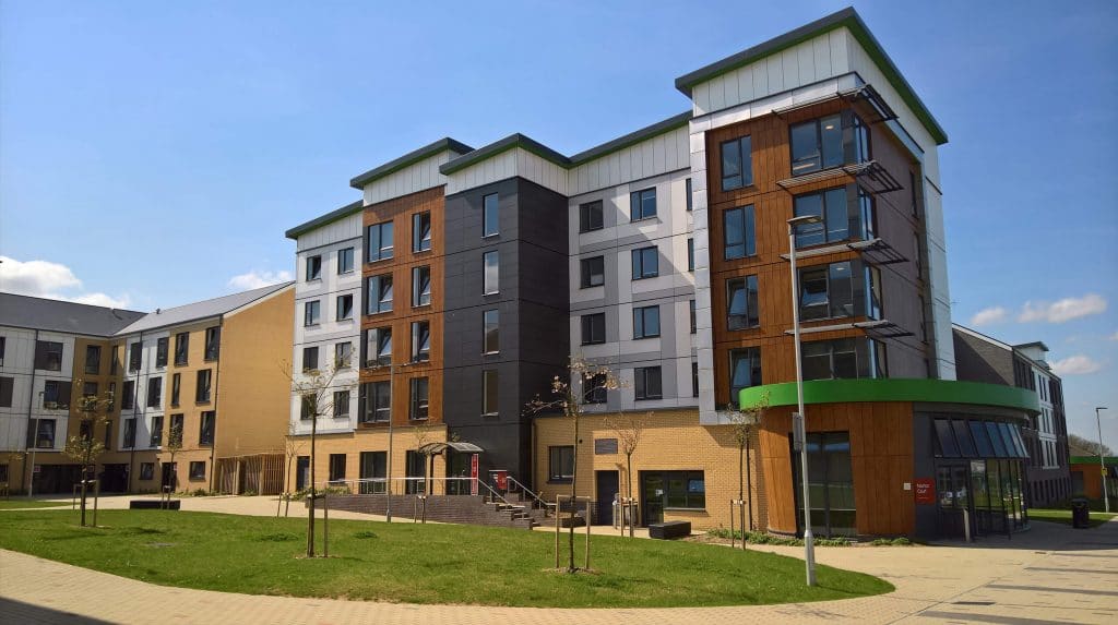 Exterior of student accommodation building including grass area