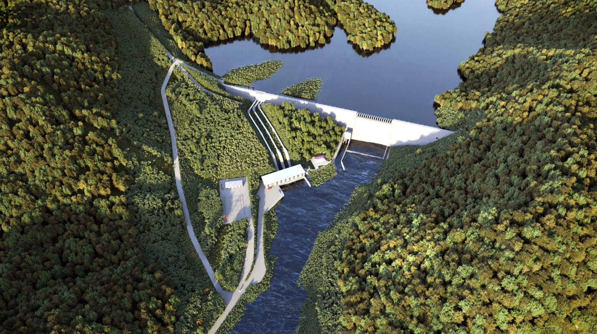 Aerial view of hydro dam surrounded by forest