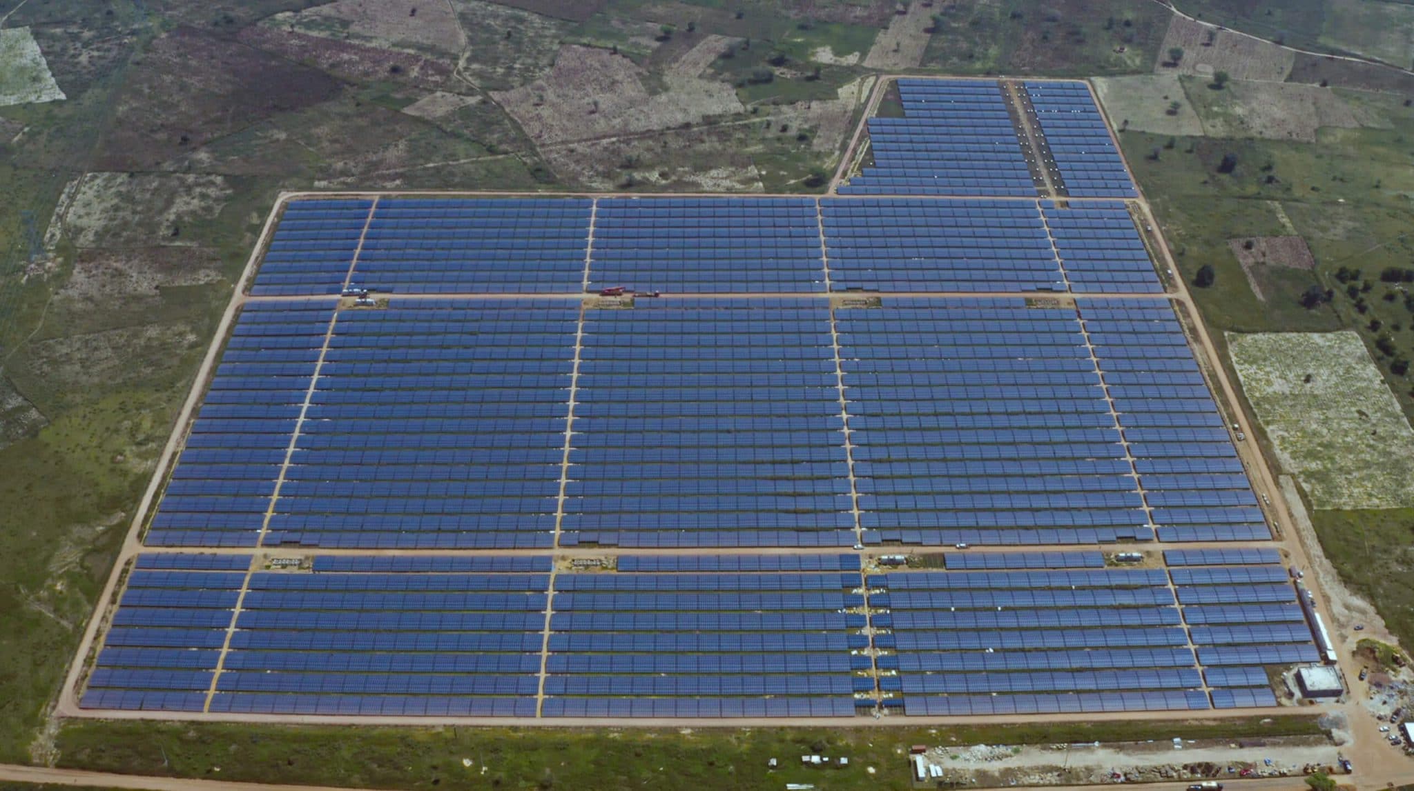 Aerial view of field of solar panels