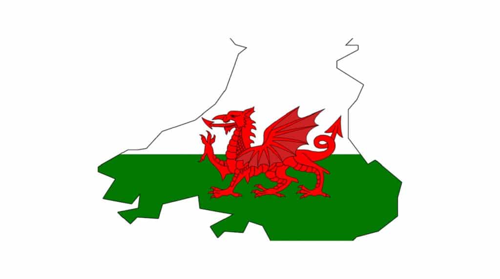 The Welsh flag in the shape of Wales