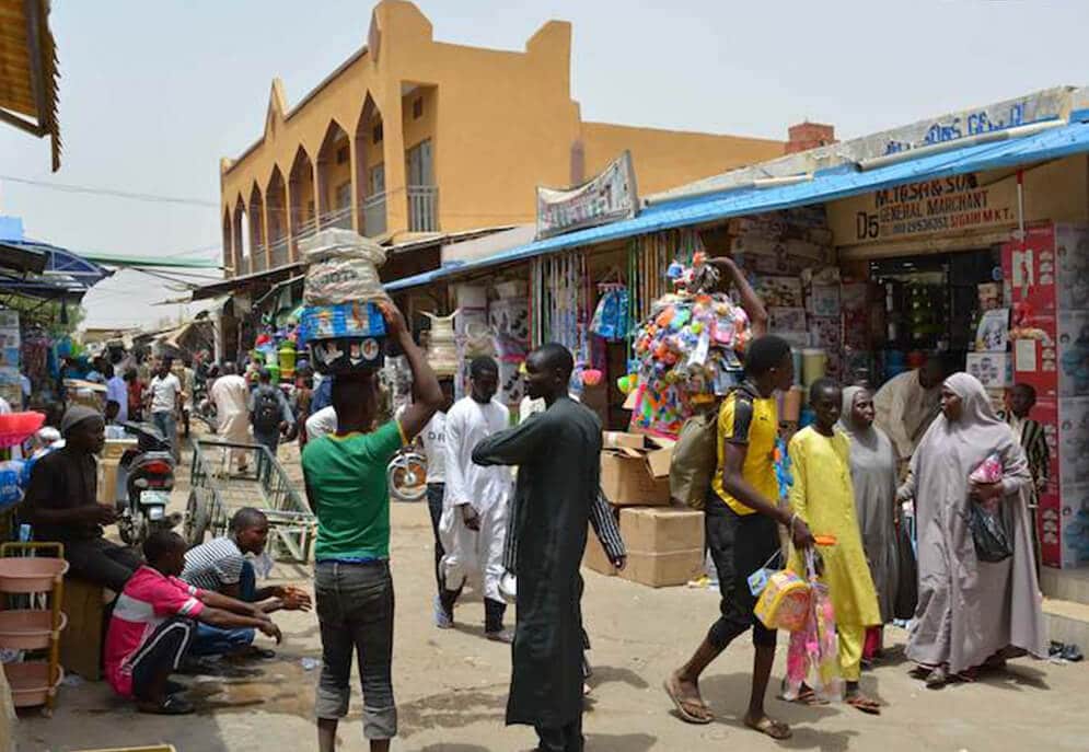 A busy market street in Kano, Nigeria